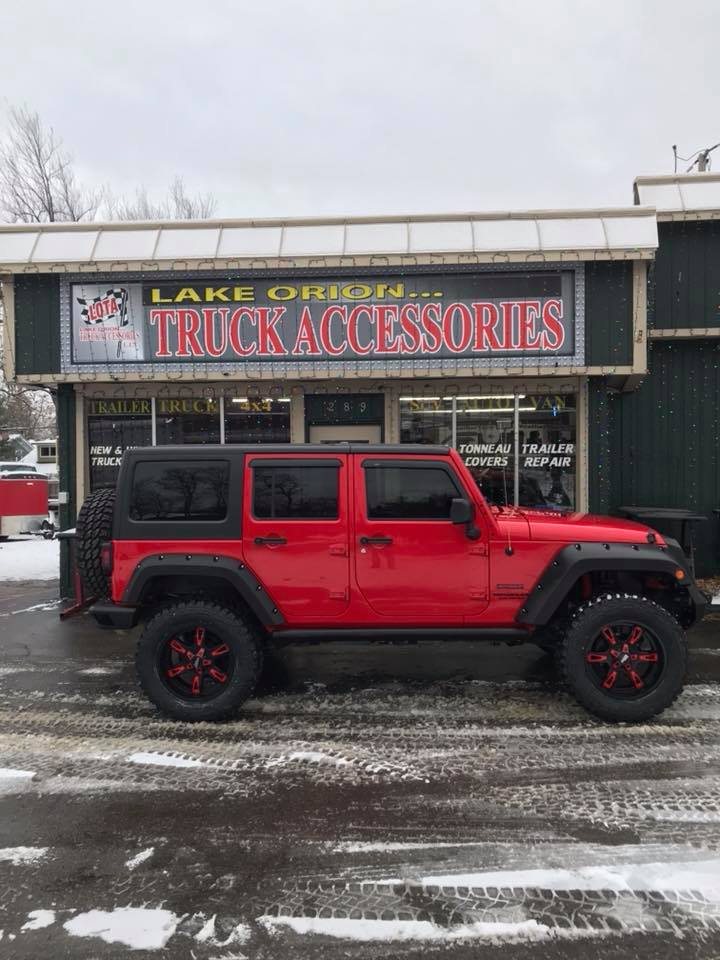 Red Jeep at the shop
